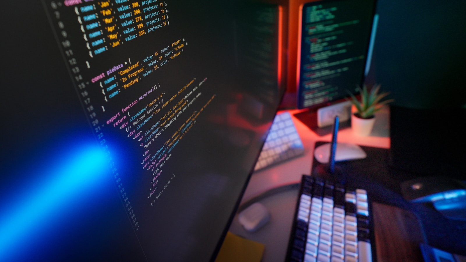 Developer workspace with code on screen and modern infrastructure feel