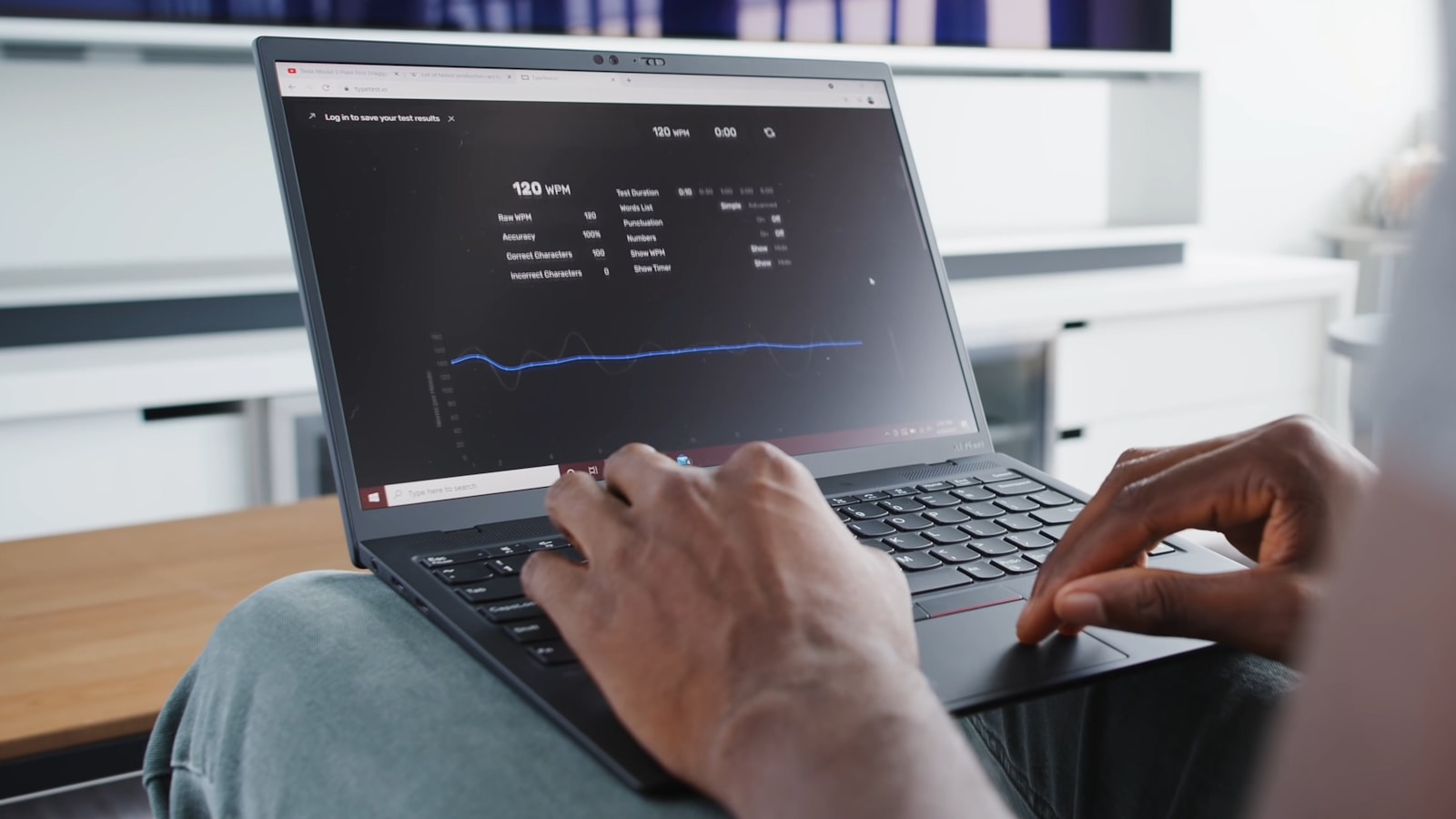 Developer workspace with automation planning on a laptop and notes